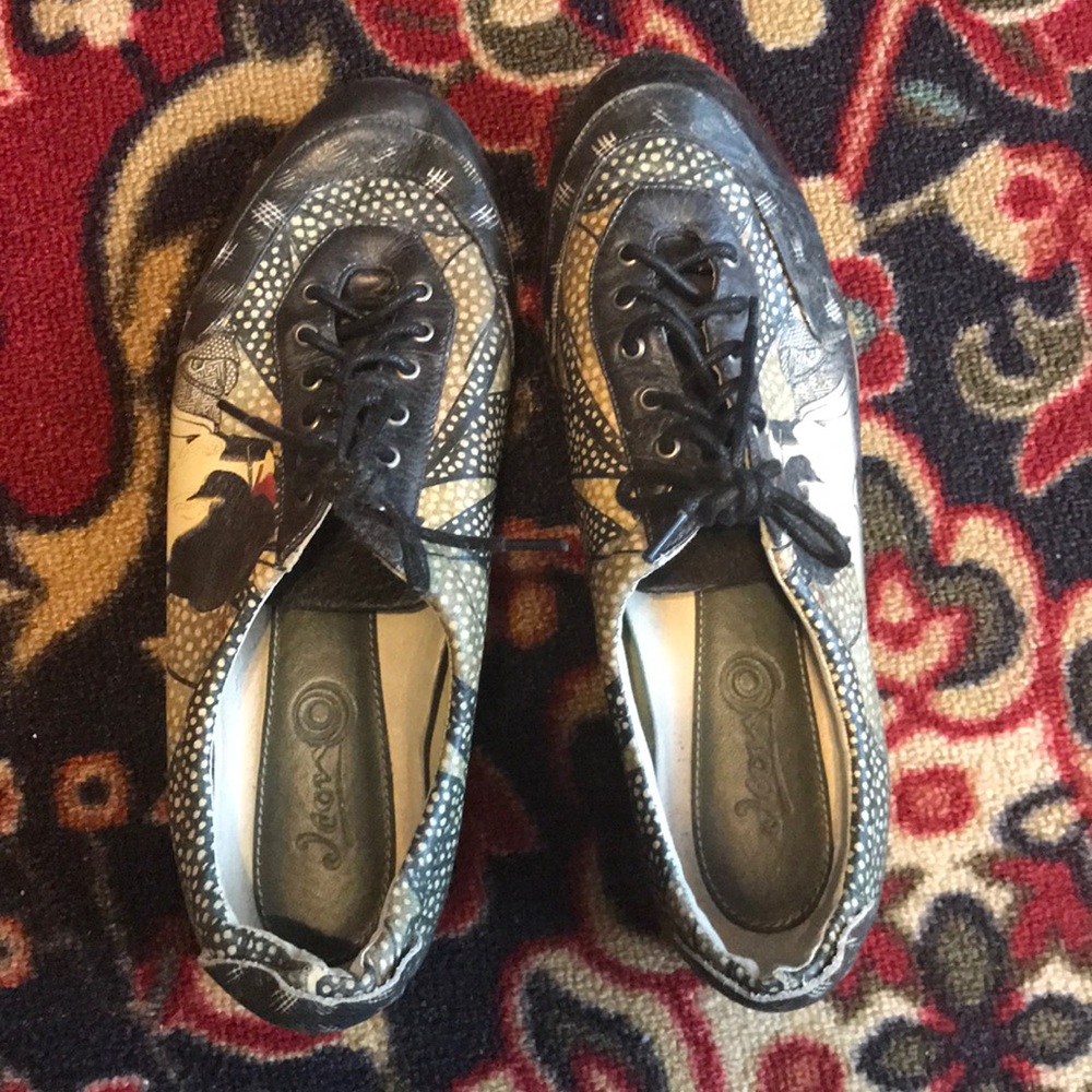 Good Used Condition printed art shoes.